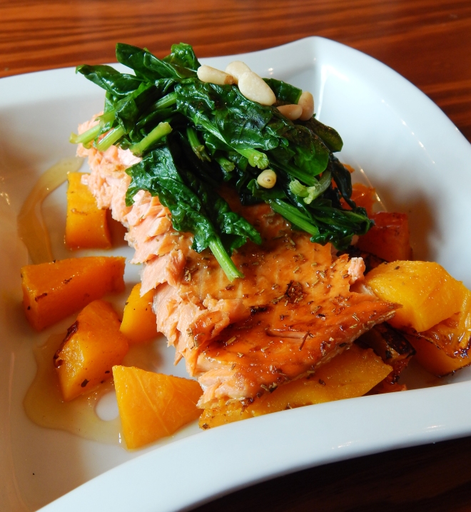 Honey Drizzled Salmon on a bed of Butternut Topped w/ Spinach